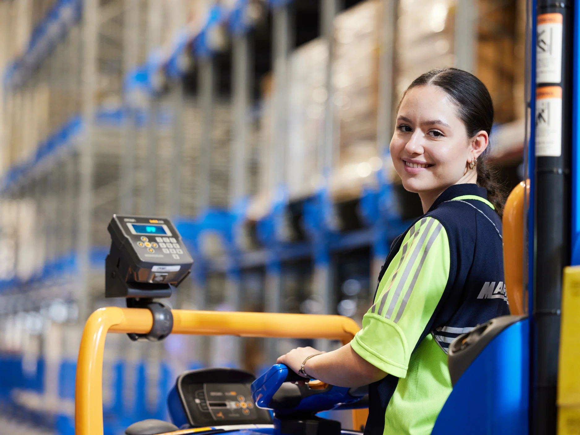 Mainfreight Team Member in a Mainfreight Warehouse