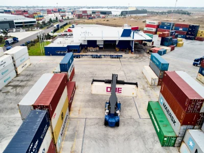 Mainfreight Wharf Stacker moving containers around Mainfreight's Altona site