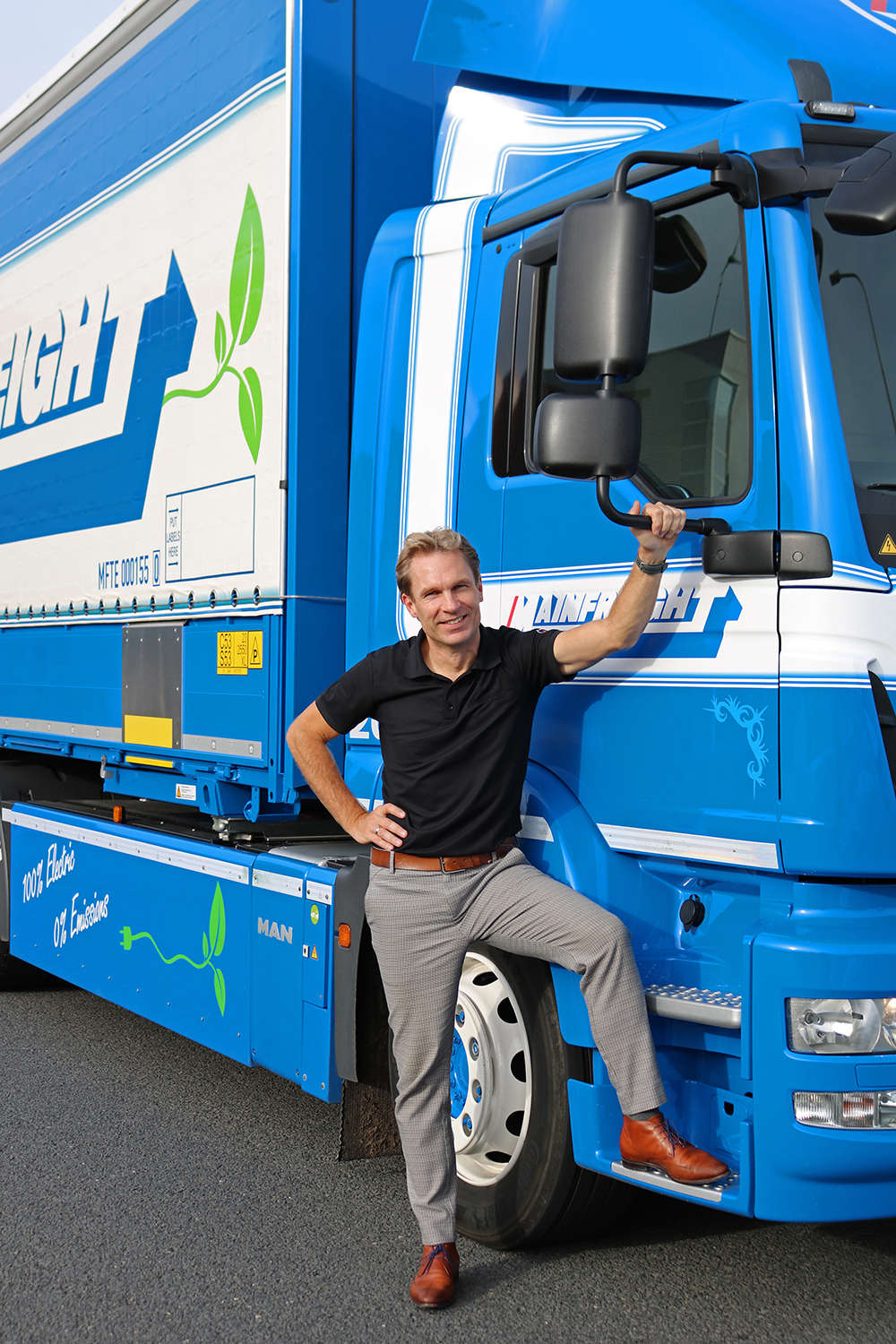 Bertil-Standing-In-Front-Of-ElectricTruck-2.jpg Bertil-Standing-In-Front-Of-ElectricTruck-2.jpg