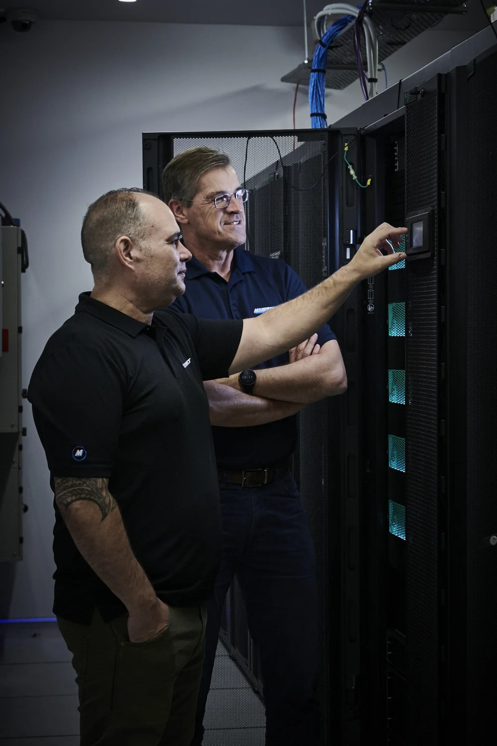 Mainfreight Technology Mainchain Automation A&O - Two Mainfreight Team Members and technology